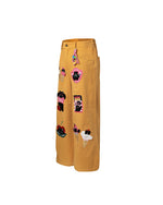 漫画の刺繍入りストレートレッグパンツ