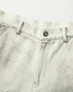 Distressed denim trousers