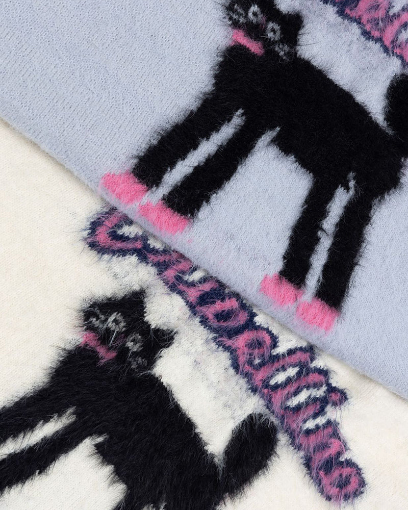 コントラストカラーのゆったりセーター