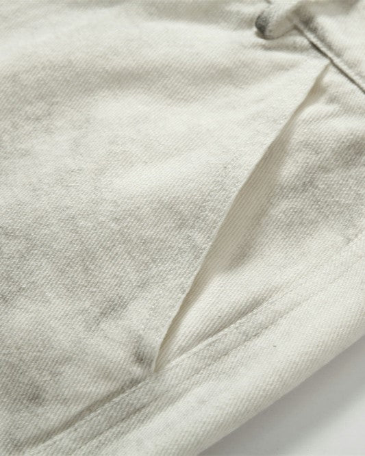 Distressed denim trousers