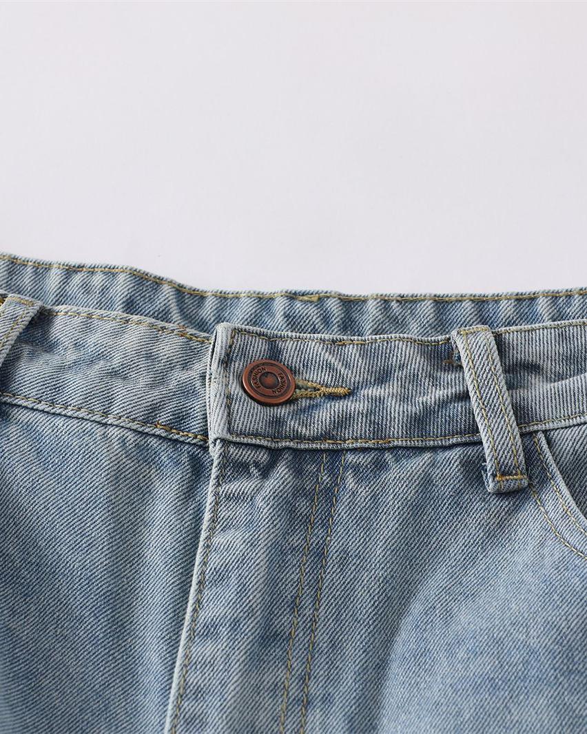 Distressed ripped denim trousers