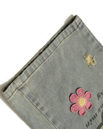 Distressed denim trousers