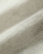 Distressed denim trousers