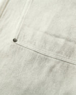 Distressed denim trousers