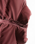 厚手のスタンドカラーダウンジャケット