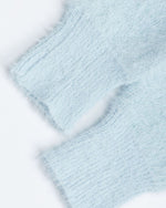 漫画風のゆったりとしたプルオーバーセーター