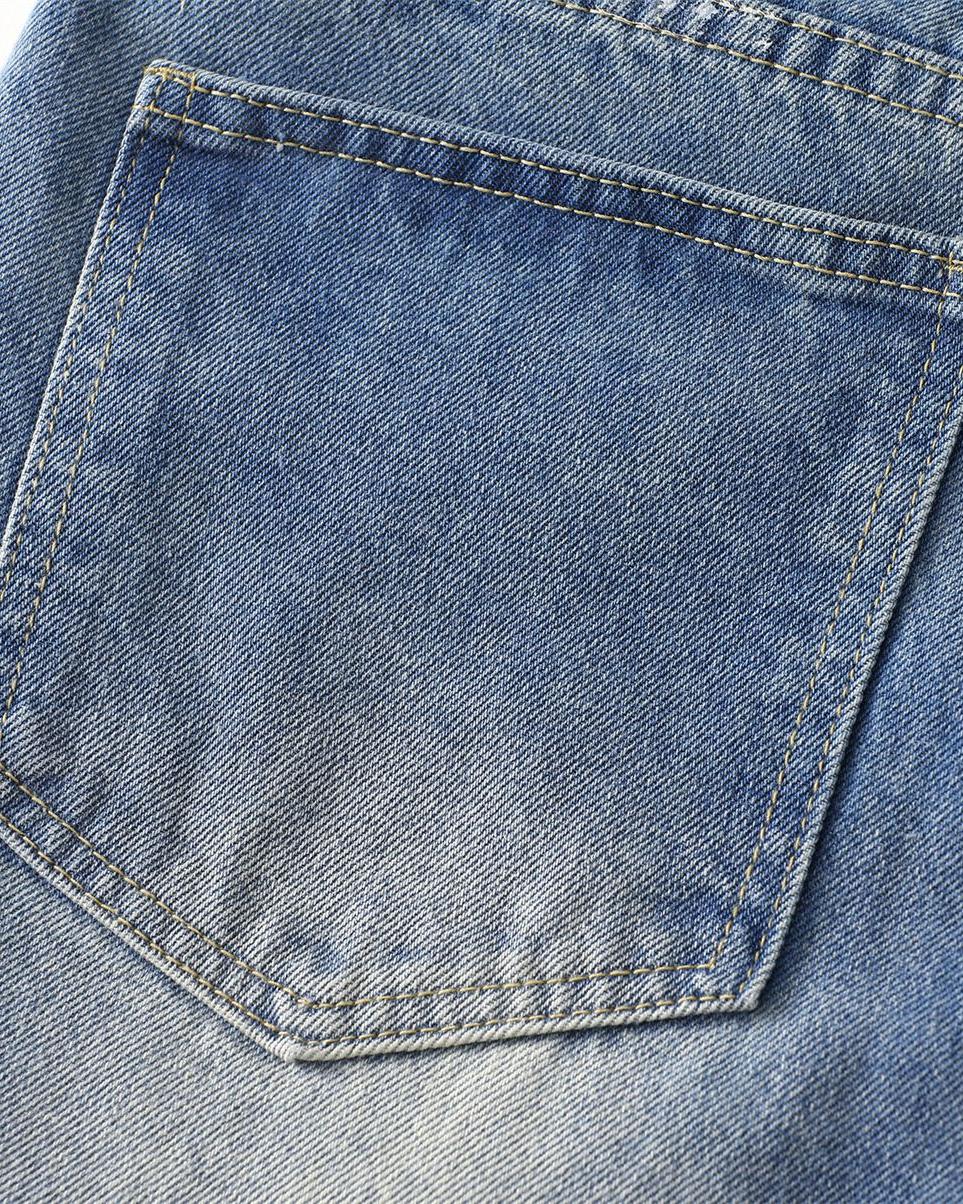 Distressed hand-painted jeans