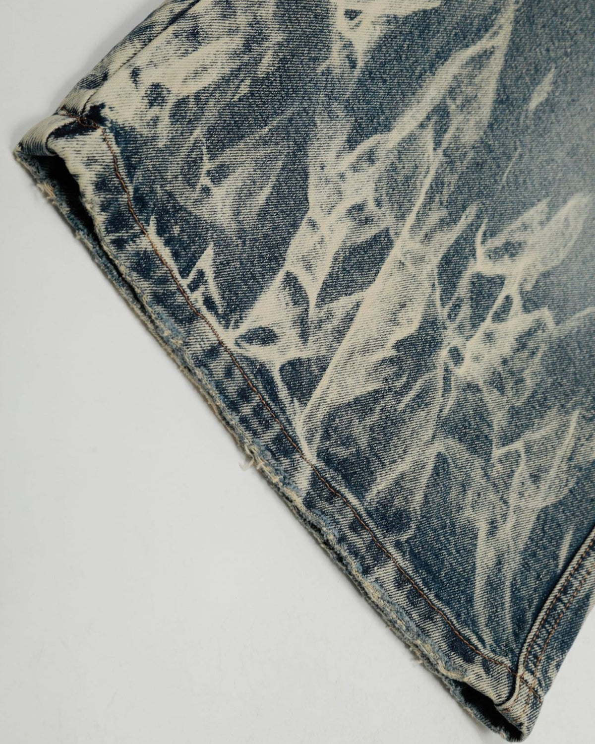 Distressed washed denim shorts