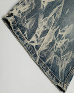 Distressed washed denim shorts