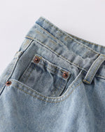 Distressed ripped denim trousers