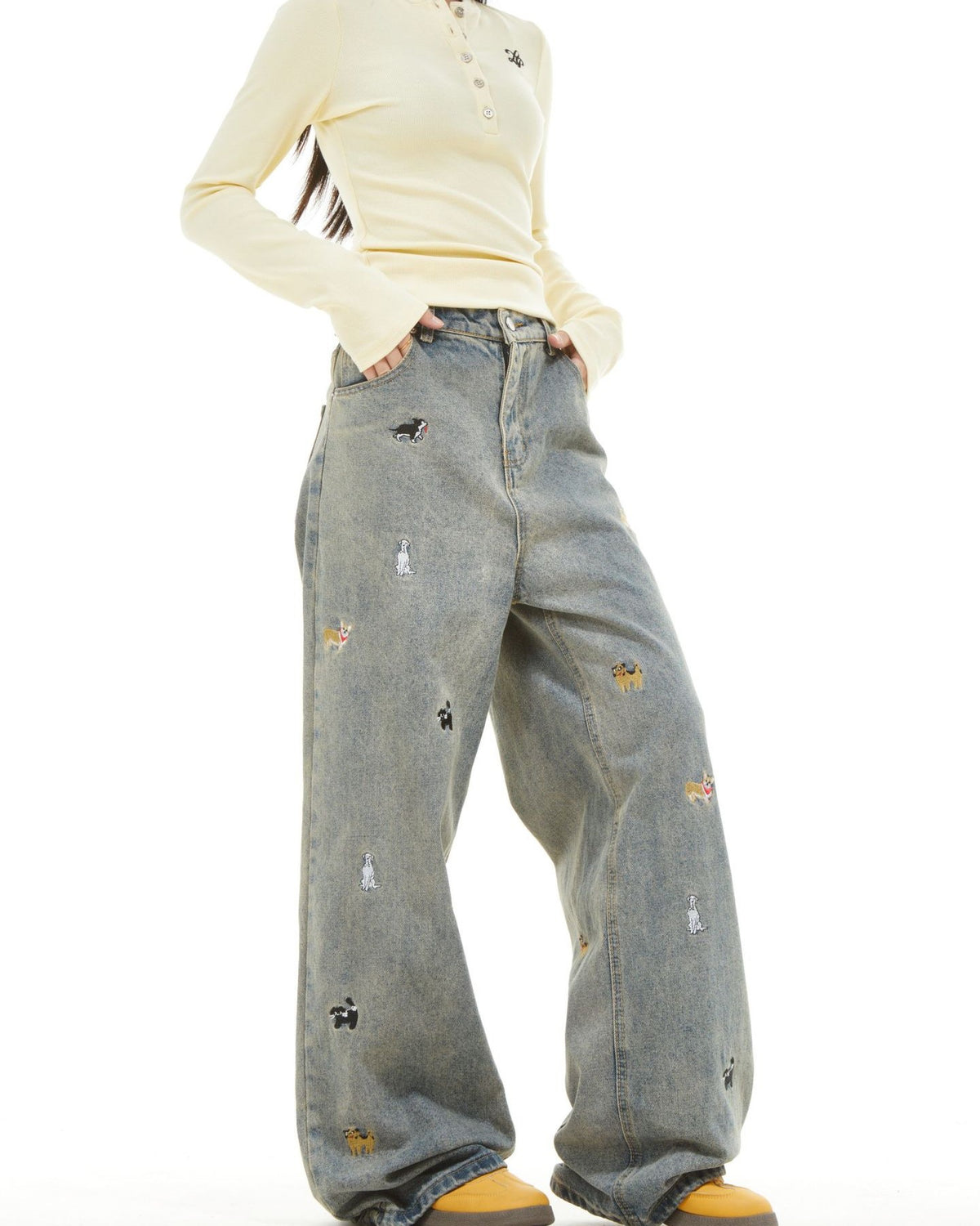 Washed distressed cartoon denim trousers
