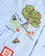 楽しいチェック柄の長袖シャツ