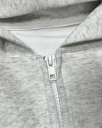 ダメージ加工のフード付きスウェットシャツ