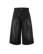 Distressed washed jeans