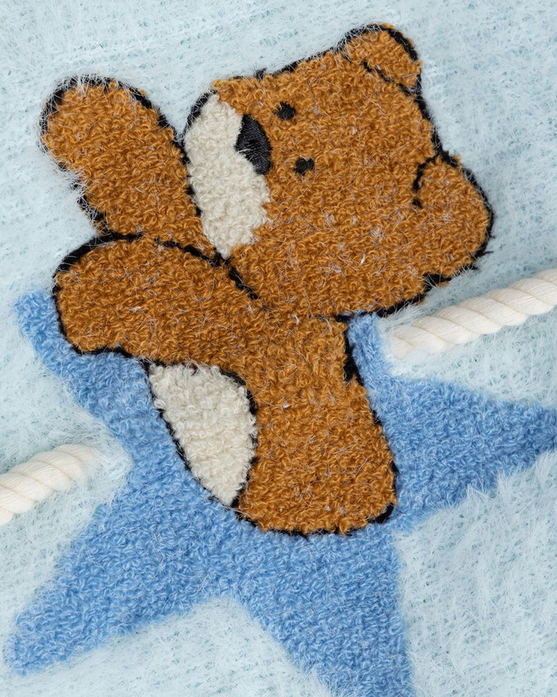 漫画風のゆったりとしたプルオーバーセーター