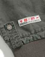 カジュアルなダメージ加工のベースボールジャケット