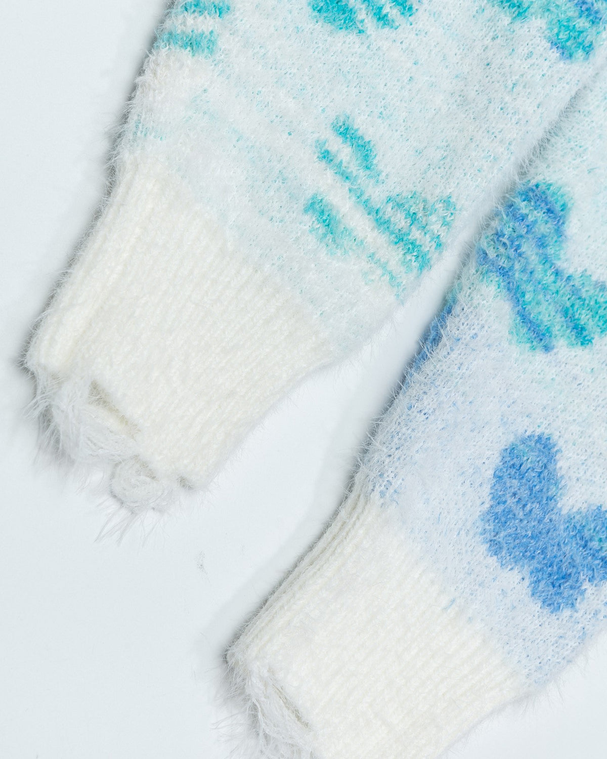 バタフライソフトセーター