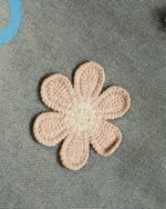 Distressed denim trousers