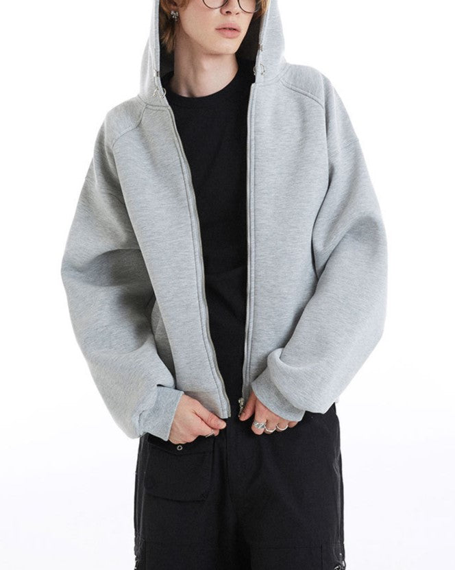 ゆったりとした無地のフード付きスウェットシャツ