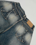 Distressed washed denim shorts