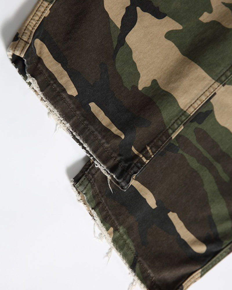 Washed ripped camouflage overalls