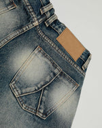 Distressed washed denim shorts