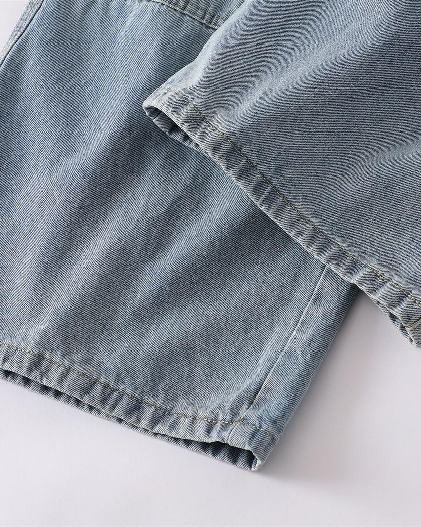 Distressed ripped denim trousers