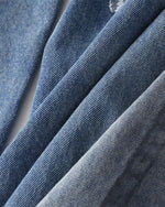 Distressed hand-painted jeans