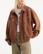 小花刺繍のベースボールジャケット