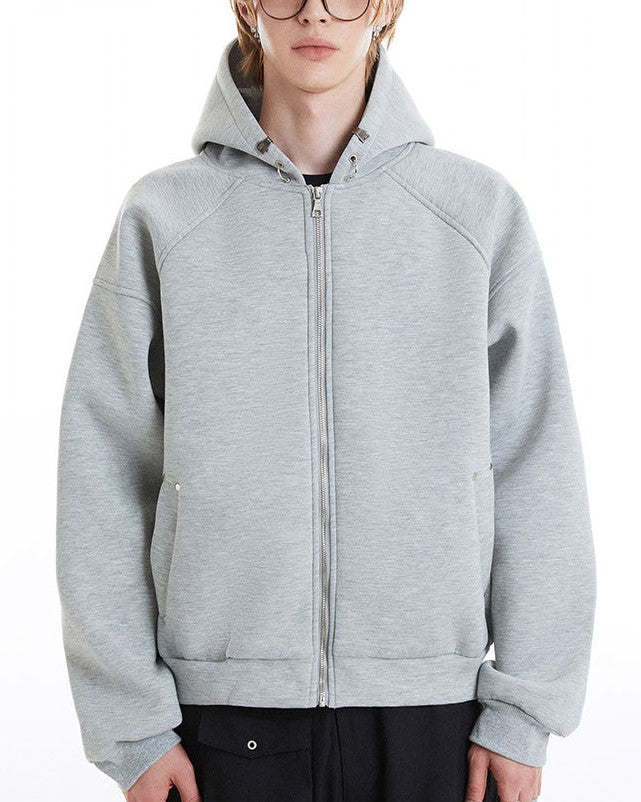 ゆったりとした無地のフード付きスウェットシャツ