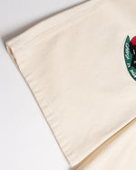 漫画の刺繍入りストレートレッグパンツ