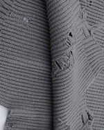 irregular hole sweater