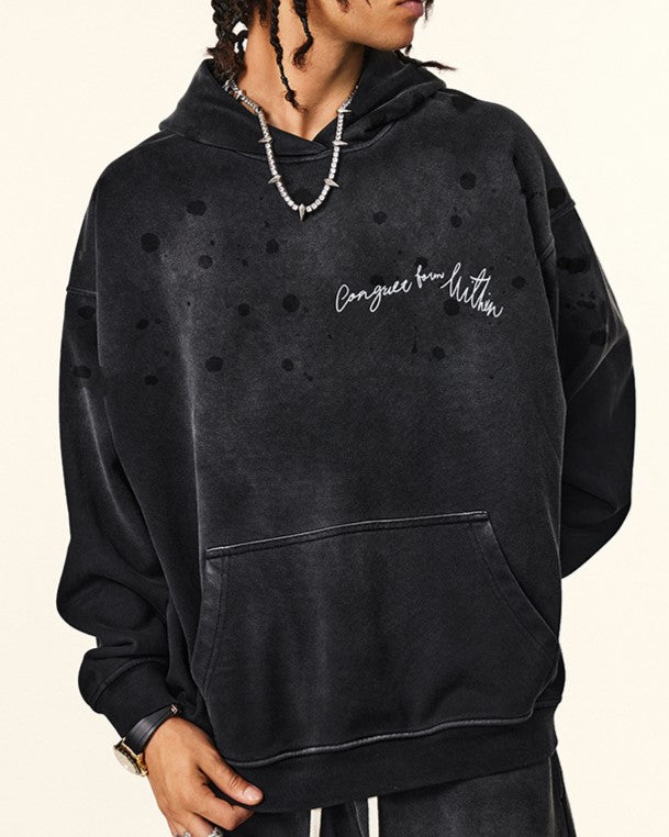 ダメージ加工のフード付きスウェットシャツ