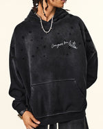 ダメージ加工のフード付きスウェットシャツ