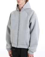 ゆったりとした無地のフード付きスウェットシャツ