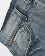 インクが飛び散ったデニムのクロップドパンツ