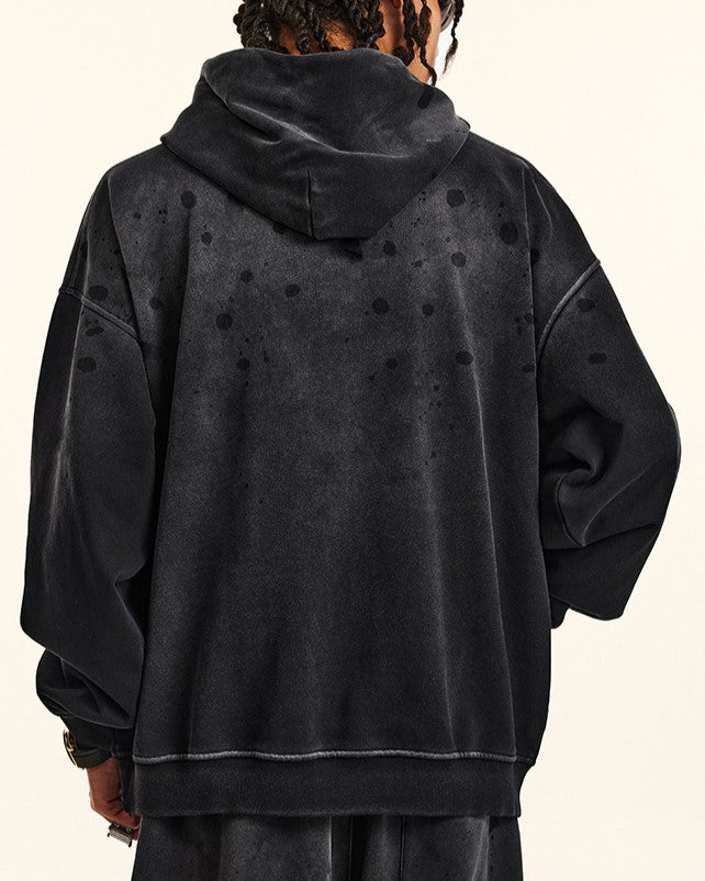 ダメージ加工のフード付きスウェットシャツ