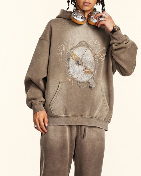 ダメージ加工のフード付きスウェットシャツ