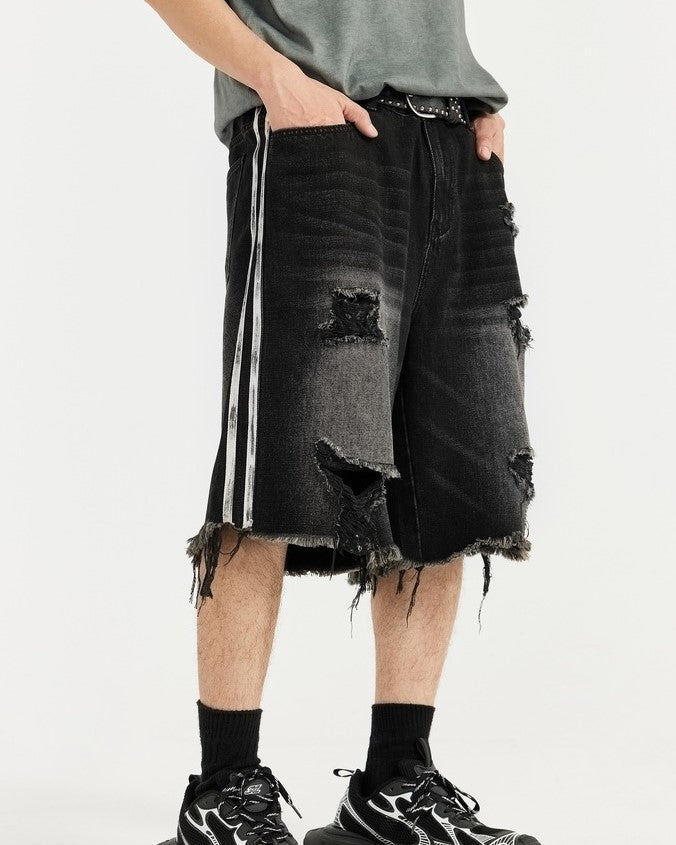 カラーブロックの破れたデニムショートパンツ