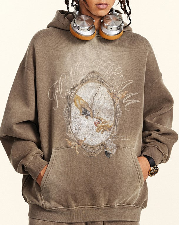 ダメージ加工のフード付きスウェットシャツ