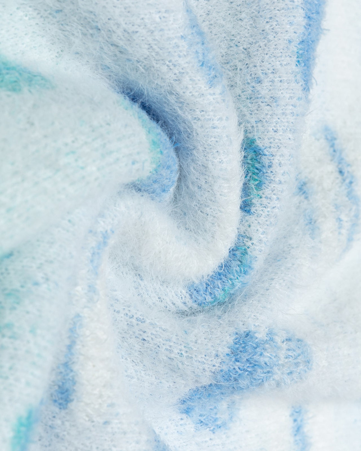 バタフライソフトセーター