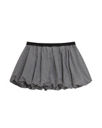 個性的な花のつぼみ柄スカート