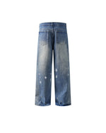 Distressed hand-painted jeans