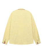 楽しいチェック柄の長袖シャツ