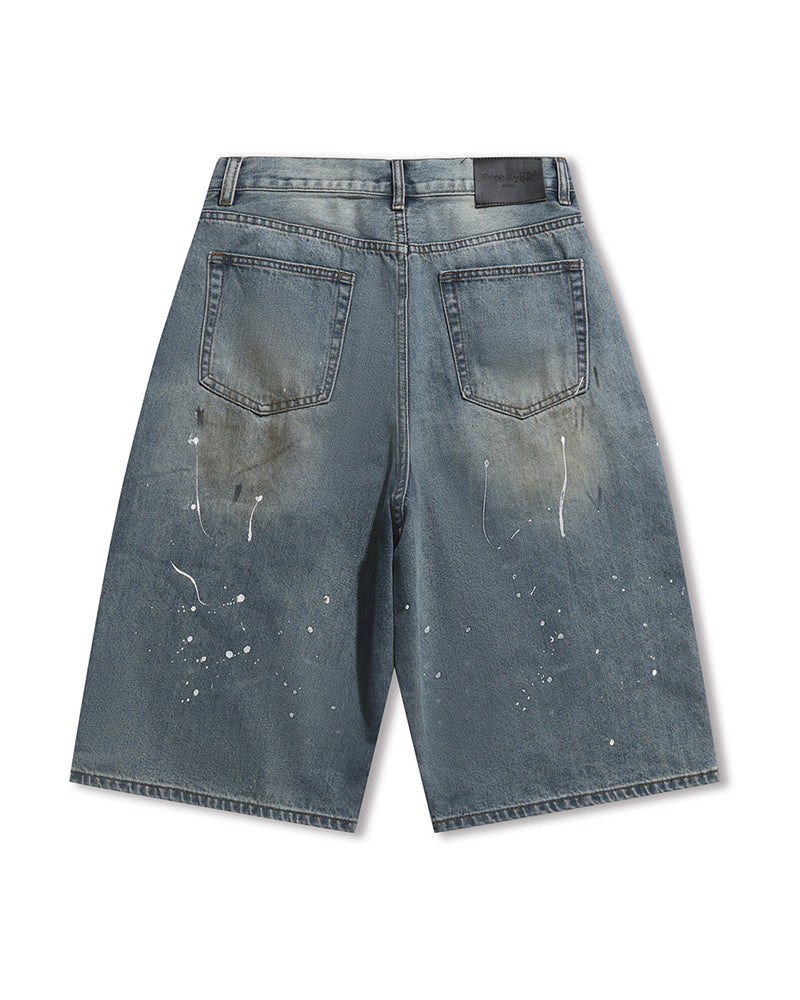 インクが飛び散ったデニムのクロップドパンツ