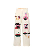 漫画の刺繍入りストレートレッグパンツ