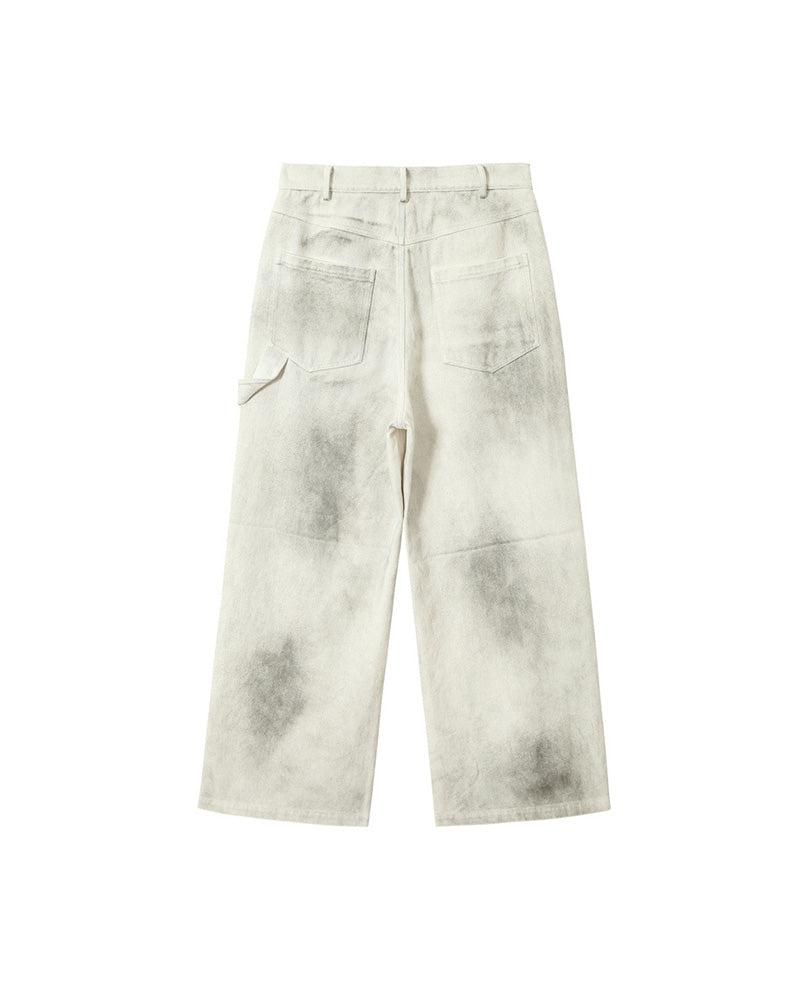 Distressed denim trousers