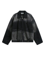 ゆったりとしたダメージ加工のジャケット