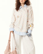 継ぎ合わせたフェイクツーピースラペルスウェットシャツ