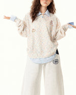 継ぎ合わせたフェイクツーピースラペルスウェットシャツ